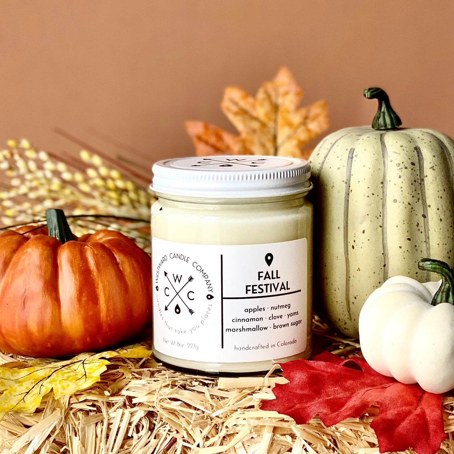 Fall Festival Soy Candle. Westward's Fall Festival candle combines the familiar scents of an autumn afternoon well spent. Gender neutral design. Handmade in Colorado with 100% soy wax, lead-free wick, phthalate-free fragrance oil and essential oil blend. Apples, Nutmeg, Cinnamon, Clove, Yams, Marshmallow, and Brown Sugar.